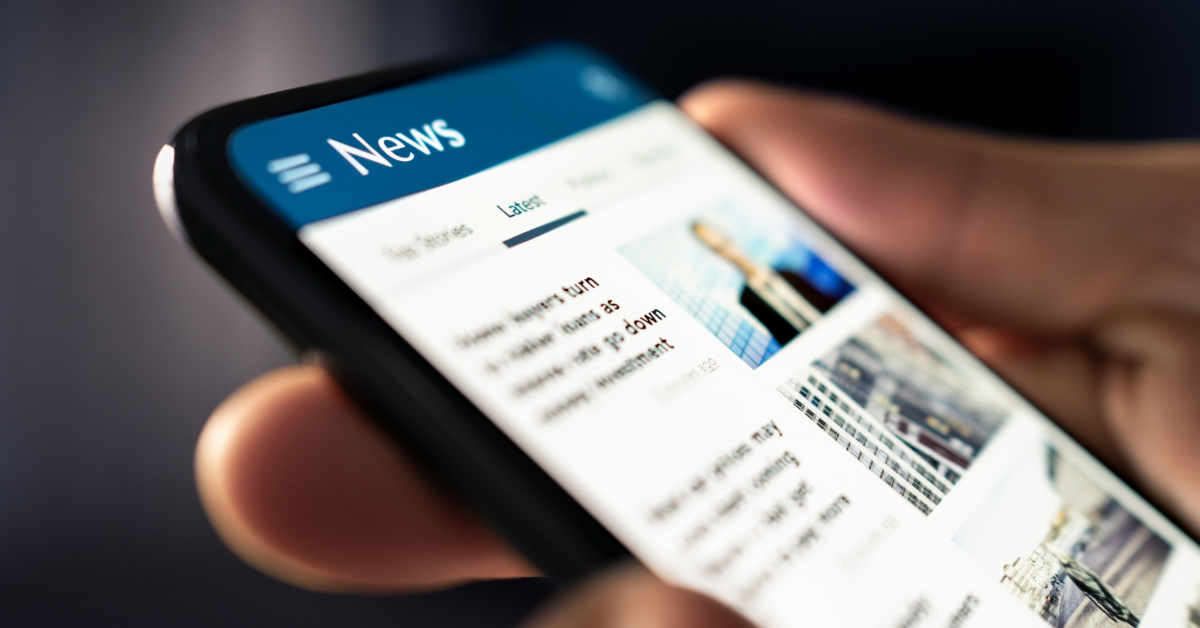Headline-and-Tagline a phone with articles showing up