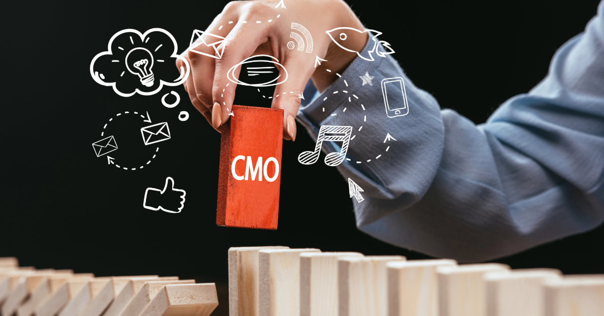 fractional-cmo (3) hand holding a block saying CMO