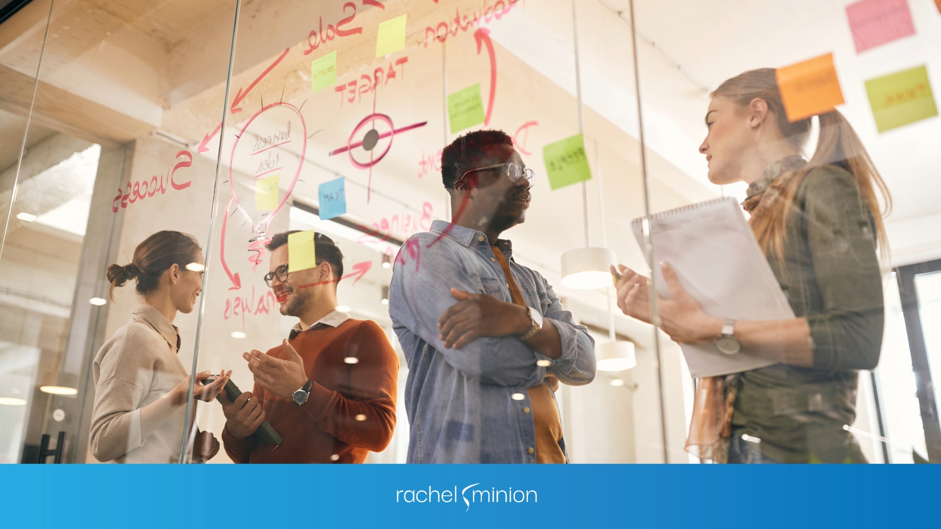 Marketing Team working on a window