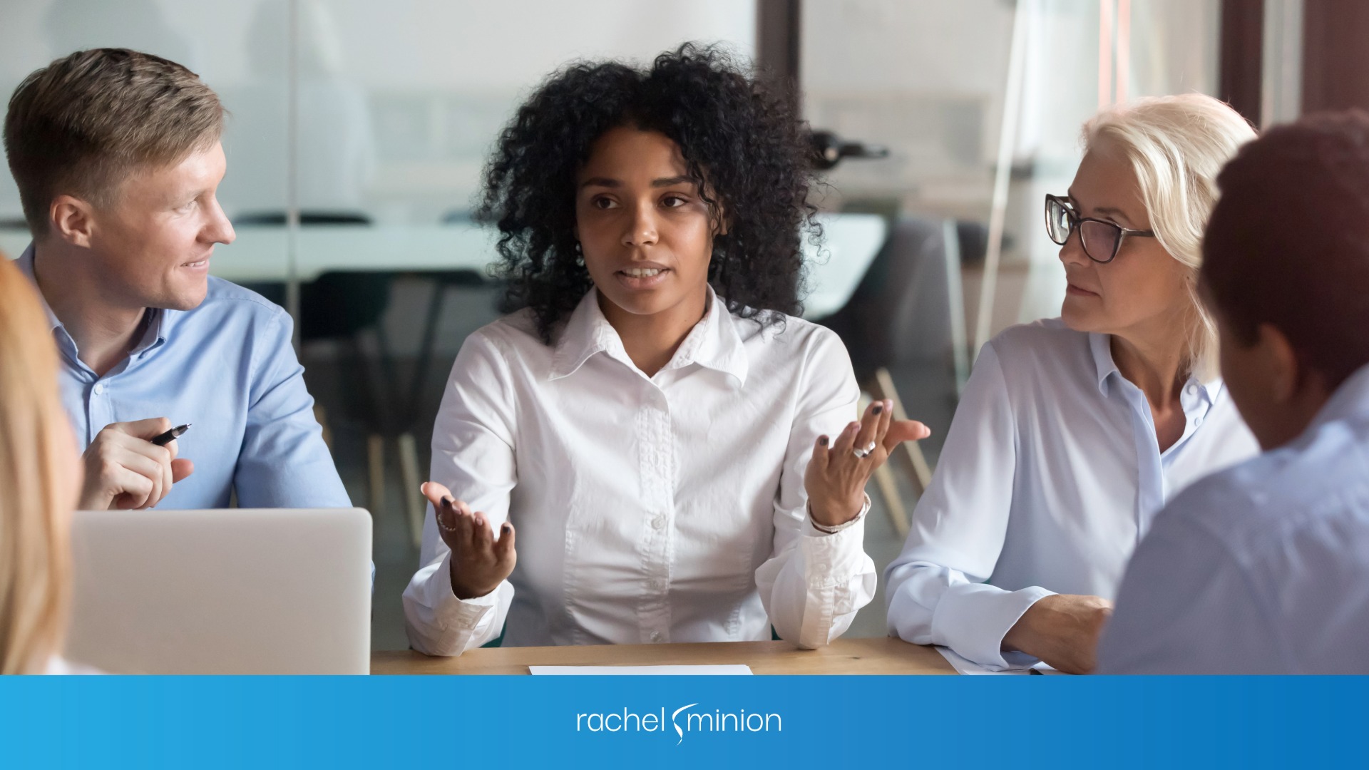 Marketing team talking in a desk