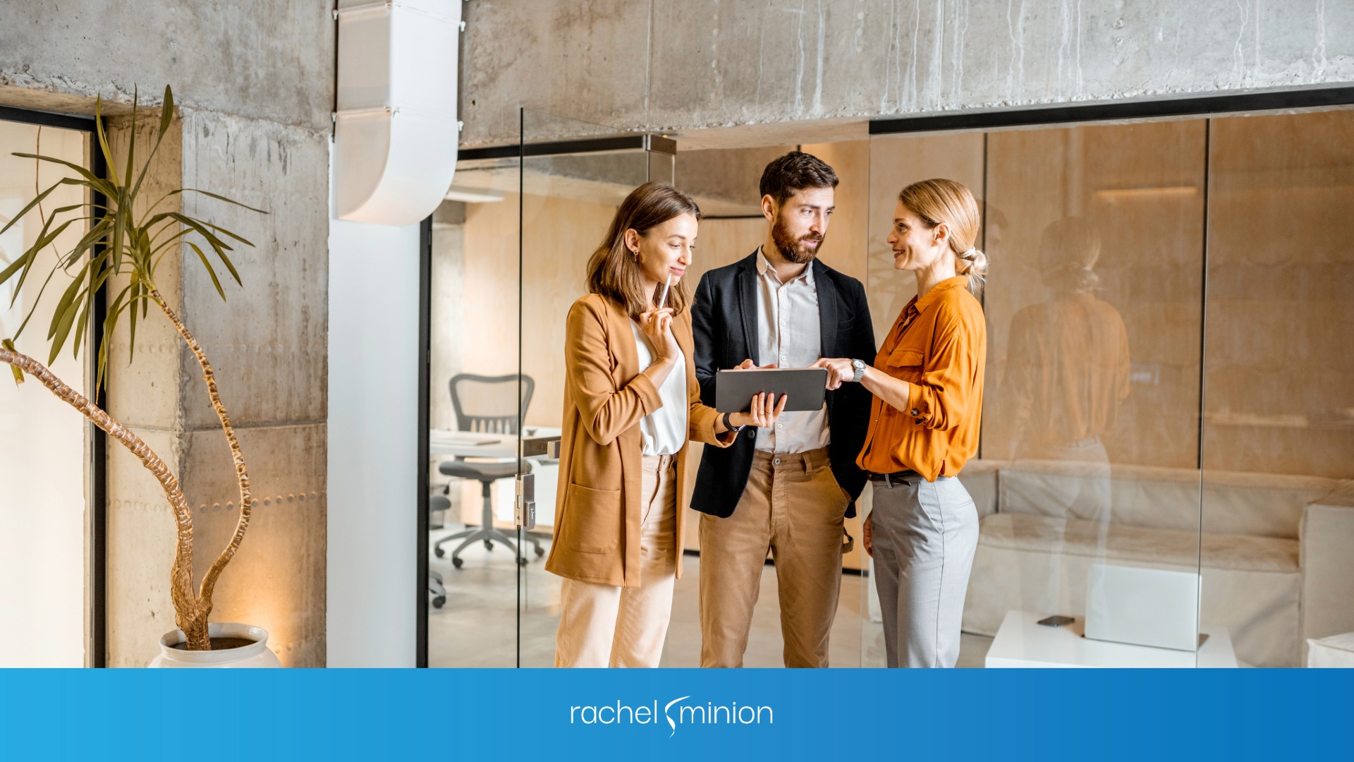  Two women and a man discussing engagement data