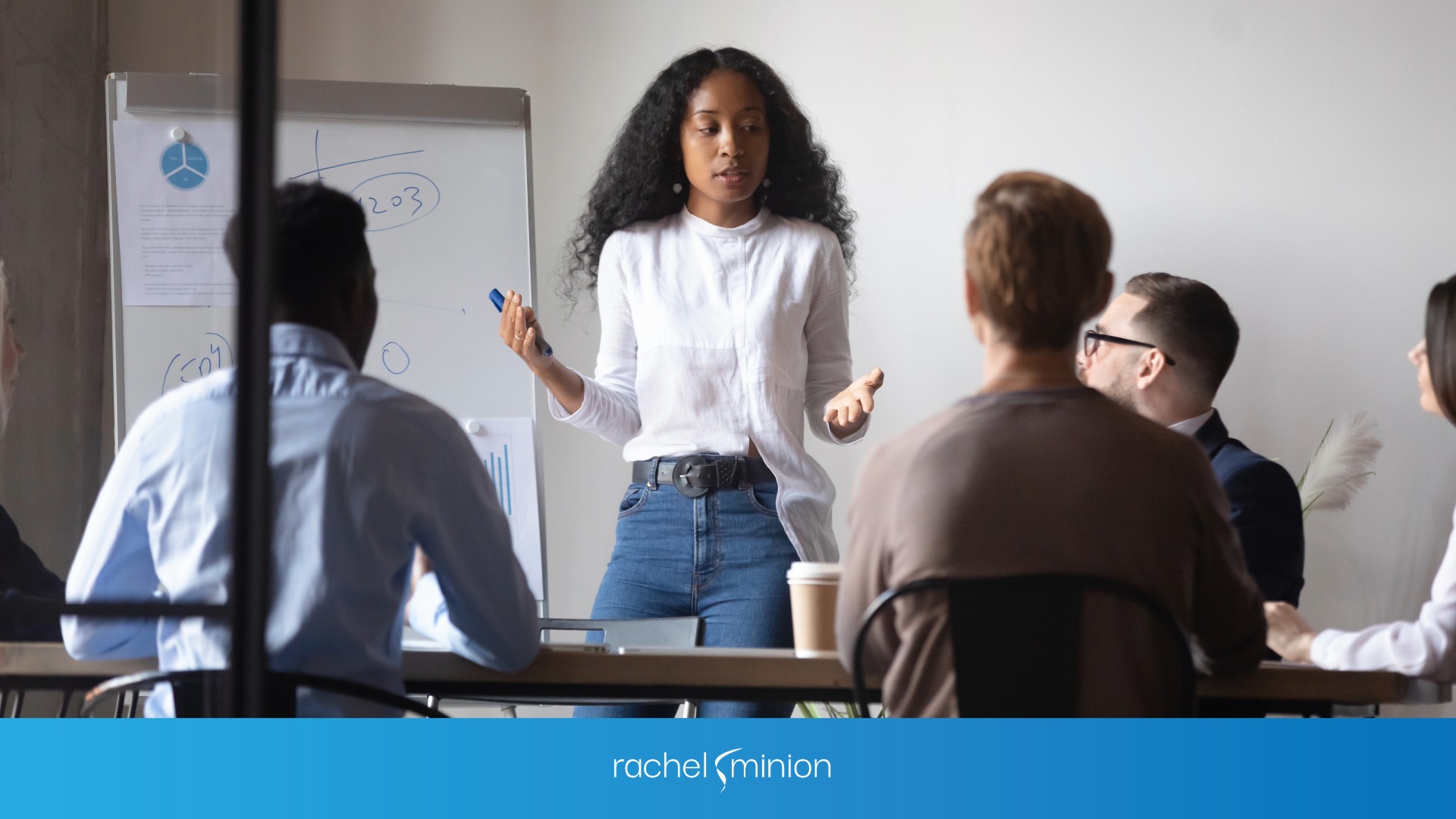 Woman explaining something to her team